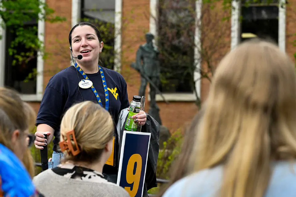 Tour leader answers questions from prospective students and families